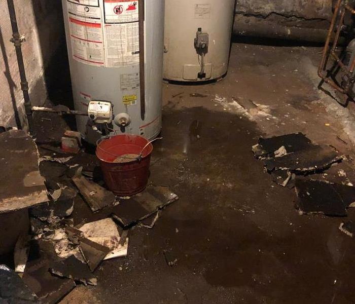 water heater wet floor and drywall