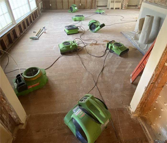 SERVPRO equipment drying out a room after a water damage